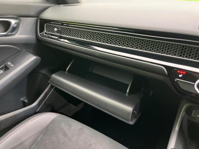 シビック ｅ：ＨＥＶ　純正９型ナビ　バックカメラ　ＢＯＳＥサウンドシステム　衝突軽減装置　レーダークルーズ　禁煙車　ハーフレザーシート　シートヒーター　パワーシート　ドラレコ　コーナーセンサー　レーンキープ　スマートキー（62枚目）
