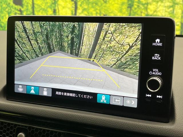 シビック ｅ：ＨＥＶ　純正９型ナビ　バックカメラ　ＢＯＳＥサウンドシステム　衝突軽減装置　レーダークルーズ　禁煙車　ハーフレザーシート　シートヒーター　パワーシート　ドラレコ　コーナーセンサー　レーンキープ　スマートキー（64枚目）