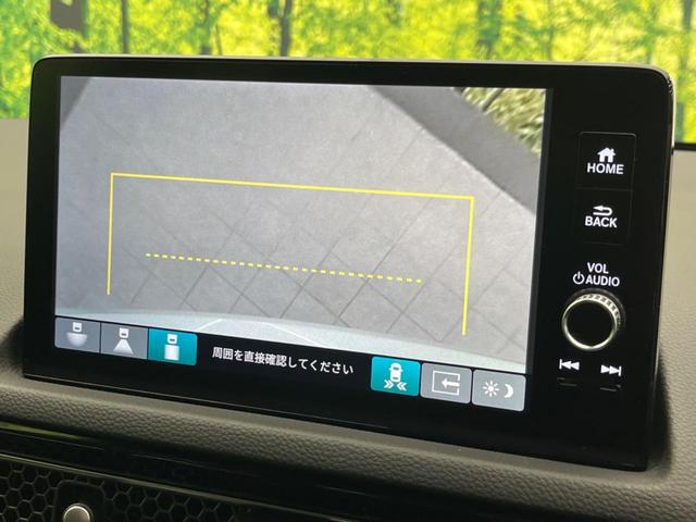 シビック ｅ：ＨＥＶ　純正９型ナビ　バックカメラ　ＢＯＳＥサウンドシステム　衝突軽減装置　レーダークルーズ　禁煙車　ハーフレザーシート　シートヒーター　パワーシート　ドラレコ　コーナーセンサー　レーンキープ　スマートキー（65枚目）