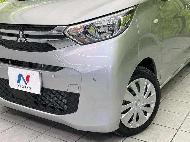 ｅＫワゴン Ｍ　衝突軽減装置　禁煙車　純正９インチナビ　バックカメラ　Ｂｌｕｅｔｏｏｔｈ　フルセグ　シートヒーター　レーンアシスト　コーナーセンサー　オートマチックハイビーム　オートライト　ステアリングスイッチ（12枚目）