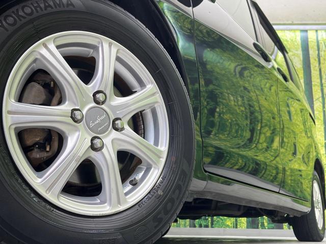 フリード GH 電動スライドドア SDナビ バックカメラ 禁煙車 スマートキー HIDヘッド ETC オートエアコン CD DVD再生 フルセグ(13枚目)