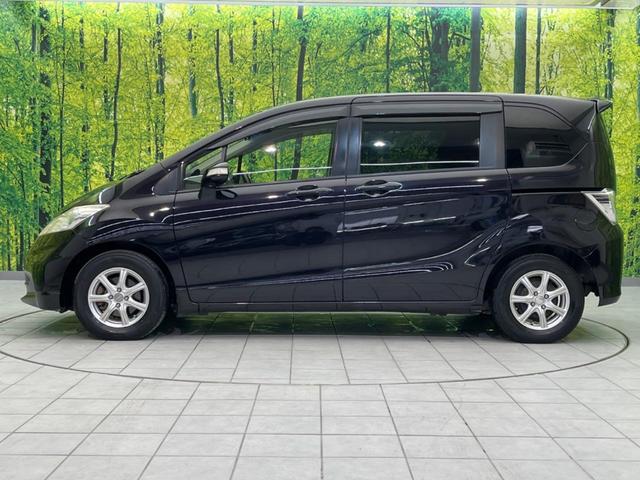 フリード GH 電動スライドドア SDナビ バックカメラ 禁煙車 スマートキー HIDヘッド ETC オートエアコン CD DVD再生 フルセグ(26枚目)