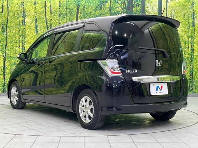 フリード GH 電動スライドドア SDナビ バックカメラ 禁煙車 スマートキー HIDヘッド ETC オートエアコン CD DVD再生 フルセグ(27枚目)