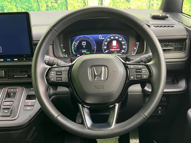 ステップワゴン ｅ：ＨＥＶスパーダ　両側電動スライドドア　衝突軽減装置　禁煙車　純正１１インチナビ　レーダークルーズ　バックカメラ　ＥＴＣ　Ｂｌｕｅｔｏｏｔｈ　シートヒーター　ハーフレザーシート　ＬＥＤヘッドライト　レーンキープアシスト（12枚目）