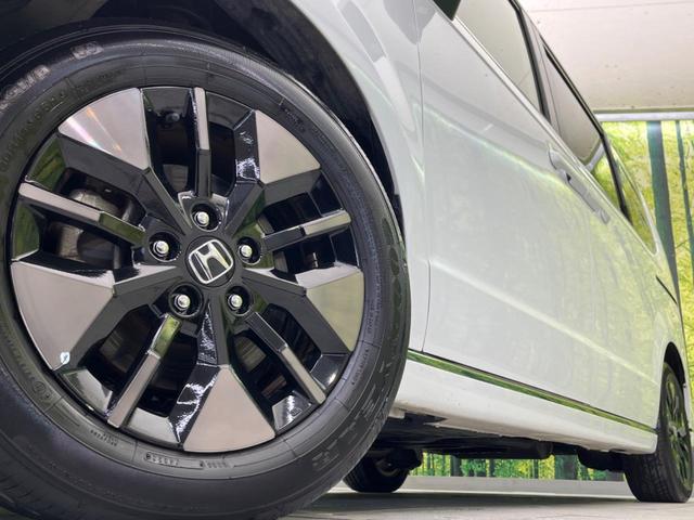 ステップワゴン ｅ：ＨＥＶスパーダ　両側電動スライドドア　衝突軽減装置　禁煙車　純正１１インチナビ　レーダークルーズ　バックカメラ　ＥＴＣ　Ｂｌｕｅｔｏｏｔｈ　シートヒーター　ハーフレザーシート　ＬＥＤヘッドライト　レーンキープアシスト（14枚目）