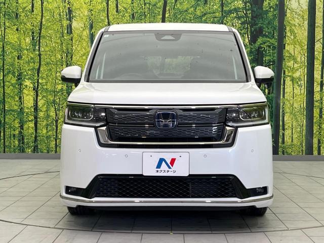 ステップワゴン ｅ：ＨＥＶスパーダ　両側電動スライドドア　衝突軽減装置　禁煙車　純正１１インチナビ　レーダークルーズ　バックカメラ　ＥＴＣ　Ｂｌｕｅｔｏｏｔｈ　シートヒーター　ハーフレザーシート　ＬＥＤヘッドライト　レーンキープアシスト（15枚目）