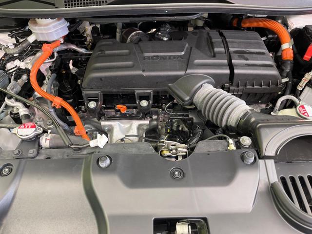 ステップワゴン ｅ：ＨＥＶスパーダ　両側電動スライドドア　衝突軽減装置　禁煙車　純正１１インチナビ　レーダークルーズ　バックカメラ　ＥＴＣ　Ｂｌｕｅｔｏｏｔｈ　シートヒーター　ハーフレザーシート　ＬＥＤヘッドライト　レーンキープアシスト（19枚目）