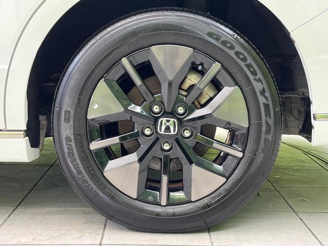 ステップワゴン ｅ：ＨＥＶスパーダ　両側電動スライドドア　衝突軽減装置　禁煙車　純正１１インチナビ　レーダークルーズ　バックカメラ　ＥＴＣ　Ｂｌｕｅｔｏｏｔｈ　シートヒーター　ハーフレザーシート　ＬＥＤヘッドライト　レーンキープアシスト（26枚目）