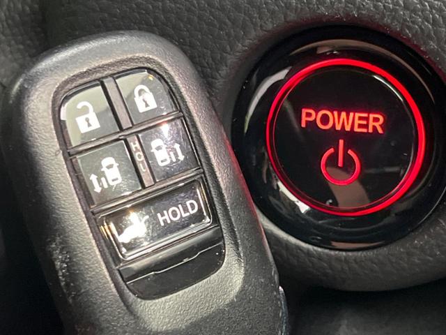 ステップワゴン ｅ：ＨＥＶスパーダ　両側電動スライドドア　衝突軽減装置　禁煙車　純正１１インチナビ　レーダークルーズ　バックカメラ　ＥＴＣ　Ｂｌｕｅｔｏｏｔｈ　シートヒーター　ハーフレザーシート　ＬＥＤヘッドライト　レーンキープアシスト（49枚目）