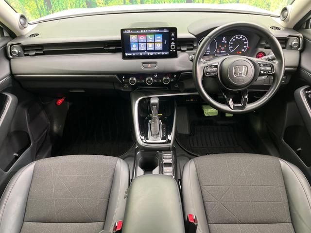 ヴェゼル ｅ：ＨＥＶ　Ｚ　純正９インチナビ　全周囲カメラ　衝突軽減装置　レーダークルーズ　禁煙車　ＬＥＤヘッドライト　ＥＴＣ　Ｂｌｕｅｔｏｏｔｈ再生　フルセグ　ドライブレコーダー　クリアランスソナー　オートマチックハイビーム（2枚目）