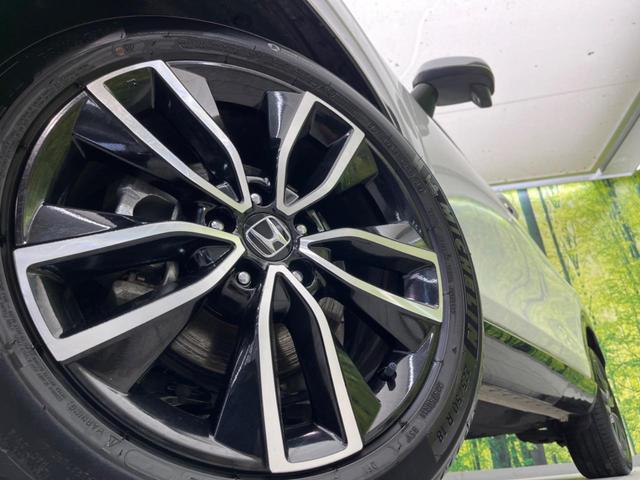 ヴェゼル ｅ：ＨＥＶ　Ｚ　ホンダセンシング　禁煙車　純正９インチナビ　アダプティブクルーズコントロール　バックカメラ　ＥＴＣ　Ｂｌｕｅｔｏｏｔｈ　フルセグ　ドライブレコーダー　スマートキー　シートヒーター　ハーフレザーシート（13枚目）