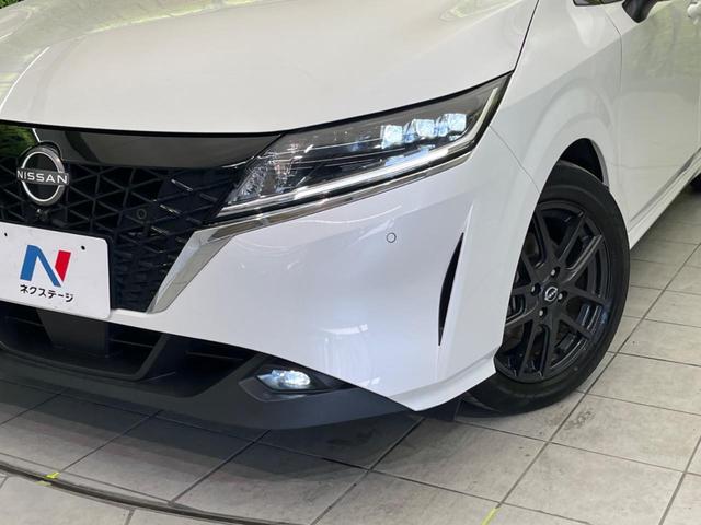 ノート Ｘ　プロパイロット　衝突軽減装置　禁煙車　純正９インチナビ　全周囲カメラ　ＥＴＣ　Ｂｌｕｅｔｏｏｔｈ　フルセグ　ドライブレコーダー　スマートキー　ＬＥＤヘッドライト　レーンアシスト　コーナーセンサー（12枚目）