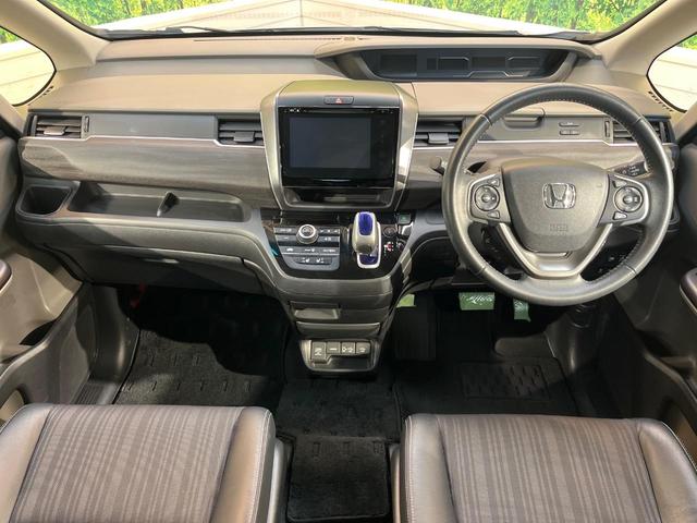 フリードハイブリッド ハイブリッド・ＥＸ　ホンダセンシング　メーカーナビ　フリップダウン　バックカメラ　両側電動ドア　アダプティブクルーズ　シートヒーター　ハーフレザーシート　ＬＥＤヘッド　純正１５アルミ　ドラレコ　ＥＴＣ　禁煙車（2枚目）