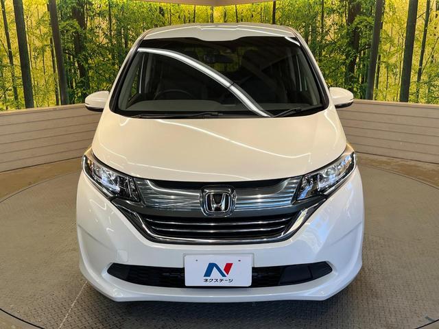 フリードハイブリッド ハイブリッド・ＥＸ　ホンダセンシング　メーカーナビ　フリップダウン　バックカメラ　両側電動ドア　アダプティブクルーズ　シートヒーター　ハーフレザーシート　ＬＥＤヘッド　純正１５アルミ　ドラレコ　ＥＴＣ　禁煙車（16枚目）