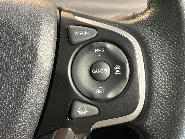 フリードハイブリッド ハイブリッド・ＥＸ　ホンダセンシング　メーカーナビ　フリップダウン　バックカメラ　両側電動ドア　アダプティブクルーズ　シートヒーター　ハーフレザーシート　ＬＥＤヘッド　純正１５アルミ　ドラレコ　ＥＴＣ　禁煙車（30枚目）