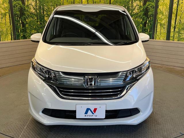 フリードハイブリッド ハイブリッド・ＥＸ　ホンダセンシング　メーカーナビ　フリップダウン　バックカメラ　両側電動ドア　アダプティブクルーズ　シートヒーター　ハーフレザーシート　ＬＥＤヘッド　純正１５アルミ　ドラレコ　ＥＴＣ　禁煙車（60枚目）