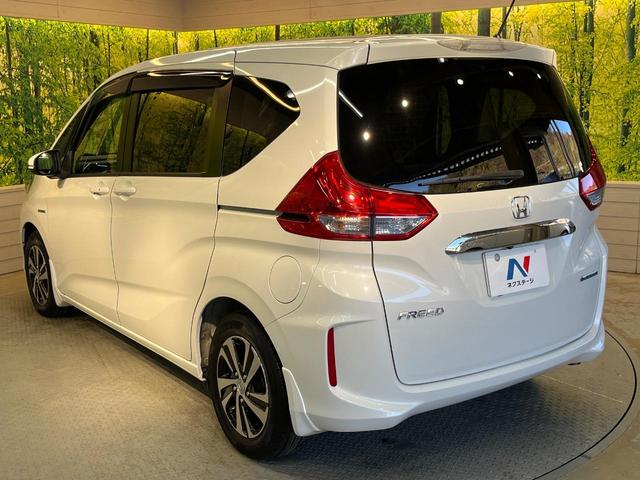 フリードハイブリッド ハイブリッド・ＥＸ　ホンダセンシング　メーカーナビ　フリップダウン　バックカメラ　両側電動ドア　アダプティブクルーズ　シートヒーター　ハーフレザーシート　ＬＥＤヘッド　純正１５アルミ　ドラレコ　ＥＴＣ　禁煙車（63枚目）
