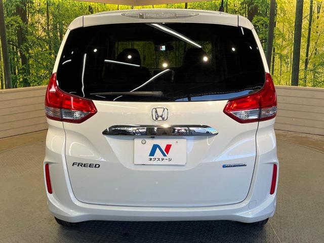フリードハイブリッド ハイブリッド・ＥＸ　ホンダセンシング　メーカーナビ　フリップダウン　バックカメラ　両側電動ドア　アダプティブクルーズ　シートヒーター　ハーフレザーシート　ＬＥＤヘッド　純正１５アルミ　ドラレコ　ＥＴＣ　禁煙車（64枚目）