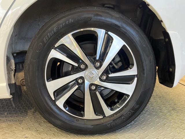 フリードハイブリッド ハイブリッド・ＥＸ　ホンダセンシング　メーカーナビ　フリップダウン　バックカメラ　両側電動ドア　アダプティブクルーズ　シートヒーター　ハーフレザーシート　ＬＥＤヘッド　純正１５アルミ　ドラレコ　ＥＴＣ　禁煙車（70枚目）