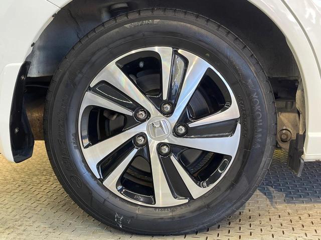 フリードハイブリッド ハイブリッド・ＥＸ　ホンダセンシング　メーカーナビ　フリップダウン　バックカメラ　両側電動ドア　アダプティブクルーズ　シートヒーター　ハーフレザーシート　ＬＥＤヘッド　純正１５アルミ　ドラレコ　ＥＴＣ　禁煙車（71枚目）