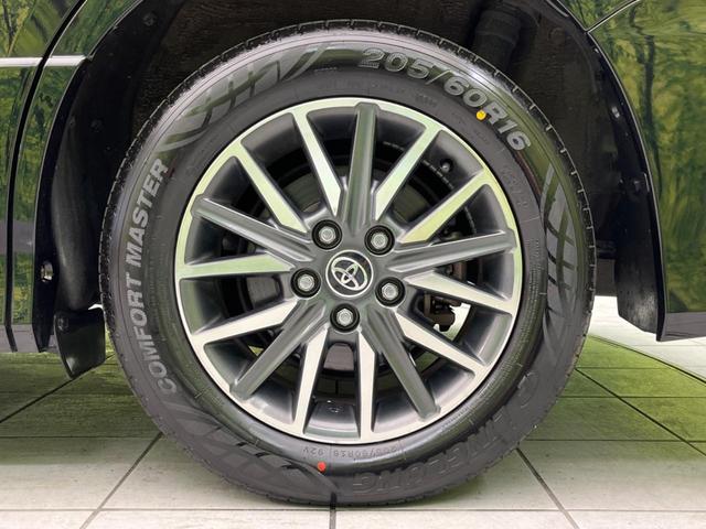 ヴォクシー ZS 煌 両側電動ドア 純正SDナビ 後席モニター バックカメラ 禁煙車 スマートキー LEDヘッドライト ビルトインETC 純正16インチアルミホイール オートライト オートエアコン(24枚目)