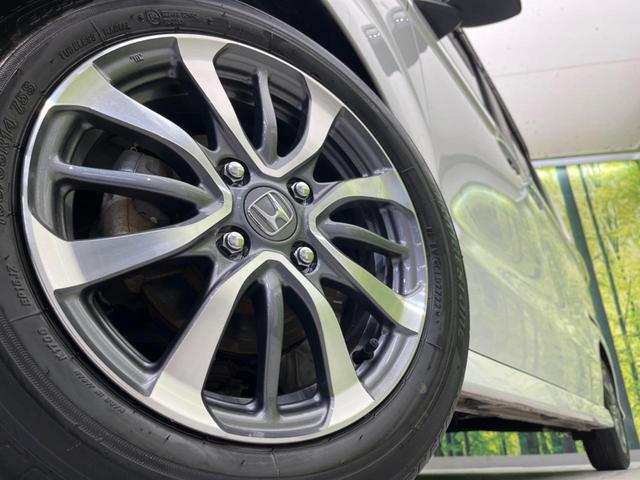 N-BOXカスタム L 両側電動ドア 純正SDナビ 禁煙車 バックカメラ 衝突被害軽減システム ドラレコ コーナーセンサー スマートキー LEDヘッド ETC 純正14インチ オートハイビーム 車線逸脱警報 電動パーキング(13枚目)