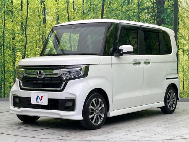 N-BOXカスタム L 両側電動ドア 純正SDナビ 禁煙車 バックカメラ 衝突被害軽減システム ドラレコ コーナーセンサー スマートキー LEDヘッド ETC 純正14インチ オートハイビーム 車線逸脱警報 電動パーキング(16枚目)