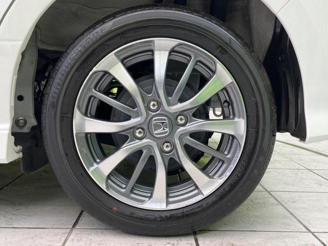 N-BOXカスタム L 両側電動ドア 純正SDナビ 禁煙車 バックカメラ 衝突被害軽減システム ドラレコ コーナーセンサー スマートキー LEDヘッド ETC 純正14インチ オートハイビーム 車線逸脱警報 電動パーキング(25枚目)