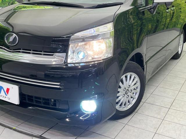 ヴォクシー ＺＳ　煌ＩＩ　両側電動ドア　ＳＤナビ　禁煙車　スマートキー　ＨＩＤヘッド　ビルトインＥＴＣ　純正１５インチアルミ　オートライト　オートエアコン　ＣＤ　ＤＶＤ再生　フルセグ　パドルシフト　ＨＩＤフォグ（12枚目）