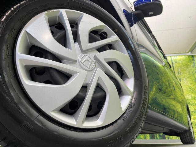 フリード Ｇ・ホンダセンシング　両側電動スライド　衝突軽減　純正ＳＤナビ　後席モニター　バックカメラ　レーダークルーズ　ドラレコ　ＥＴＣ　スマートキー　レーンアシスト　電動格納ミラー　Ｂｌｕｅｔｏｏｔｈ再生　ＣＤ／ＤＶＤ（14枚目）