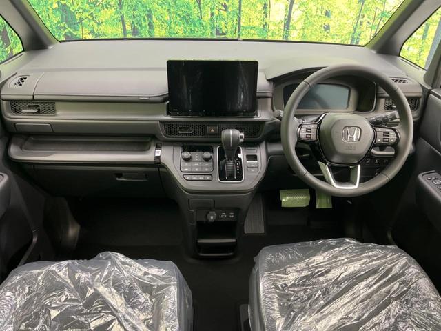 ステップワゴン スパーダ　未登録済未使用車　両側電動スライド　衝突軽減　純正１１．４インチ純正ナビ　バックカメラ　禁煙車　レーダークルーズ　スマートキー　ＬＥＤヘッド　シートヒータ　ハーフレザーシー（2枚目）