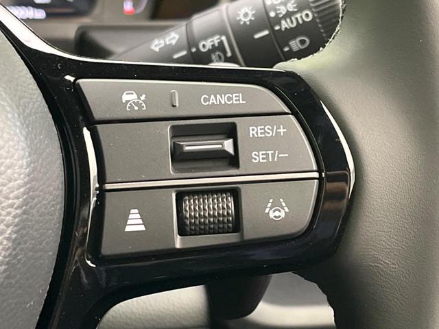 ステップワゴン スパーダ　未登録済未使用車　両側電動スライド　衝突軽減　純正１１．４インチ純正ナビ　バックカメラ　禁煙車　レーダークルーズ　スマートキー　ＬＥＤヘッド　シートヒータ　ハーフレザーシー（7枚目）