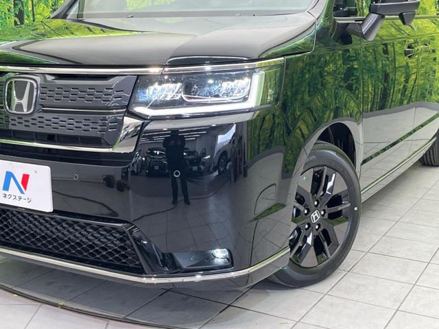 ステップワゴン スパーダ　未登録済未使用車　両側電動スライド　衝突軽減　純正１１．４インチ純正ナビ　バックカメラ　禁煙車　レーダークルーズ　スマートキー　ＬＥＤヘッド　シートヒータ　ハーフレザーシー（13枚目）