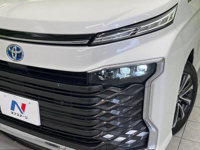 ヴォクシー ハイブリッドＳ－Ｚ　１４インチ後席モニター　両側電動スライドドア　衝突軽減装置　純正１０．５インチナビ　レーダークルーズコントロール　バックカメラ　ＥＴＣ２．０　フルセグ　シートヒーター　ハーフレザーシート　ＬＥＤヘッド（13枚目）