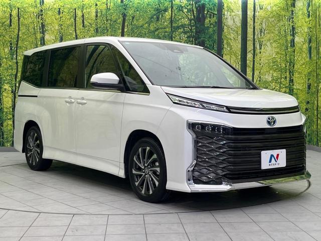 ヴォクシー ハイブリッドＳ－Ｚ　１４インチ後席モニター　両側電動スライドドア　衝突軽減装置　純正１０．５インチナビ　レーダークルーズコントロール　バックカメラ　ＥＴＣ２．０　フルセグ　シートヒーター　ハーフレザーシート　ＬＥＤヘッド（37枚目）