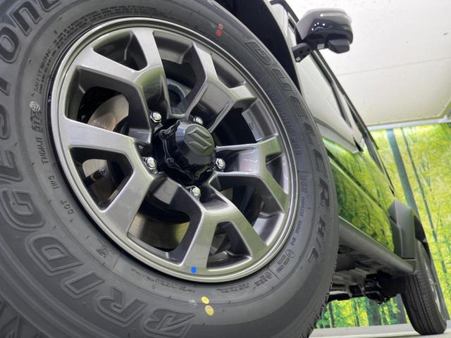 ジムニーノマド ＦＣ　登録済未使用車　４ＷＤ　衝突軽減装置　レーダークルーズコントロール　コーナーセンサー　スマートキー　シートヒーター　オートライト　オートエアコン　ステアリングスイッチ　革巻きステアリング（13枚目）