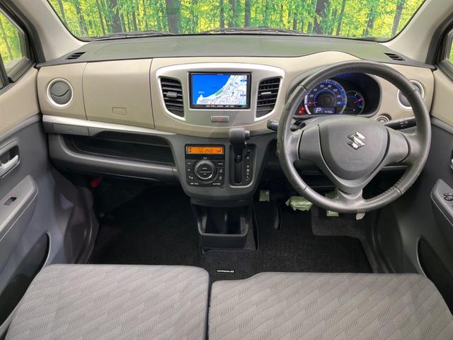 ワゴンＲ ＦＸリミテッド　ＳＤナビ　禁煙車　スマートキー　純正１４インチアルミ　オートエアコン　ＣＤ　プライバシーガラス　アイドリングストップ　電動格納ミラー（2枚目）