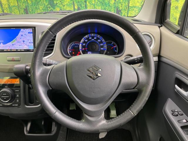 ワゴンＲ ＦＸリミテッド　ＳＤナビ　禁煙車　スマートキー　純正１４インチアルミ　オートエアコン　ＣＤ　プライバシーガラス　アイドリングストップ　電動格納ミラー（11枚目）