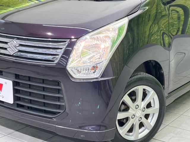 ワゴンＲ ＦＸリミテッド　ＳＤナビ　禁煙車　スマートキー　純正１４インチアルミ　オートエアコン　ＣＤ　プライバシーガラス　アイドリングストップ　電動格納ミラー（12枚目）