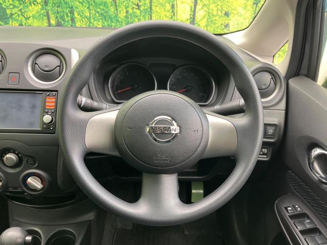 ノート Ｘ　純正ＳＤナビ　禁煙車　ドラレコ　ＥＴＣ　スマートキー　ＨＩＤヘッド　電動格納ミラー　ＣＤ再生　アイドリングストップ　盗難防止システム　プライバシーＧ　頸部衝突緩和ヘッドレスト（10枚目）