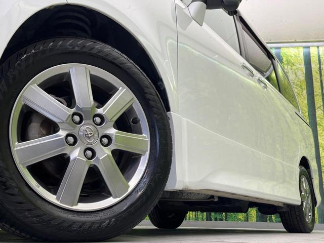 ヴォクシー ＺＳ　煌ＩＩ　両側電動スライド　純正ナビ　ＥＴＣ　禁煙車　パドルシフト　ＨＩＤヘッド　オートライト　スマートキー　デュアルエアコン　ＣＤ／ＤＶＤ再生　盗難防止システム　電動格納ミラー（14枚目）