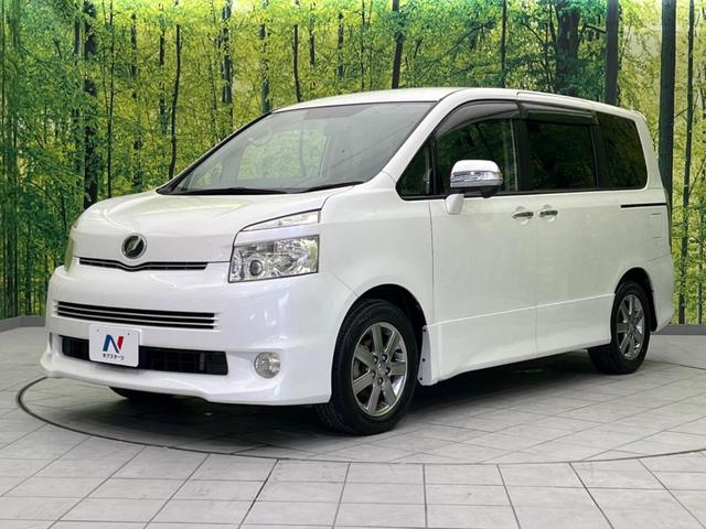 ヴォクシー ＺＳ　煌ＩＩ　両側電動スライド　純正ナビ　ＥＴＣ　禁煙車　パドルシフト　ＨＩＤヘッド　オートライト　スマートキー　デュアルエアコン　ＣＤ／ＤＶＤ再生　盗難防止システム　電動格納ミラー（29枚目）