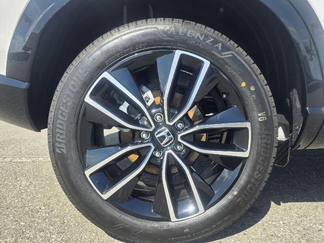 ヴェゼル ｅ：ＨＥＶ　Ｚ　ホンダコネクト９インチナビ　ＬＥＤヘッドライト　純正１８インチアルミ　ハーフレザーシート　ワンオーナー　スペアキー　パワーテールゲート　ブラインドスポットインフォメーション（10枚目）