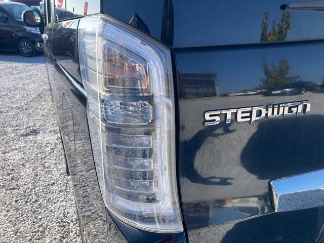 ステップワゴンスパーダ Ｚ　クールスピリット　両側パワースライドドア・ＥＴＣ・クルーズコントロール・パドルシフト・バックカメラ・オートエアコン・フォグランプ・オートライト・ＵＳＢ接続・電動格納ミラー・ＨＤＤナビ・ＡＭ・ＦＭ・ＤＶＤ・横すべり防止（32枚目）