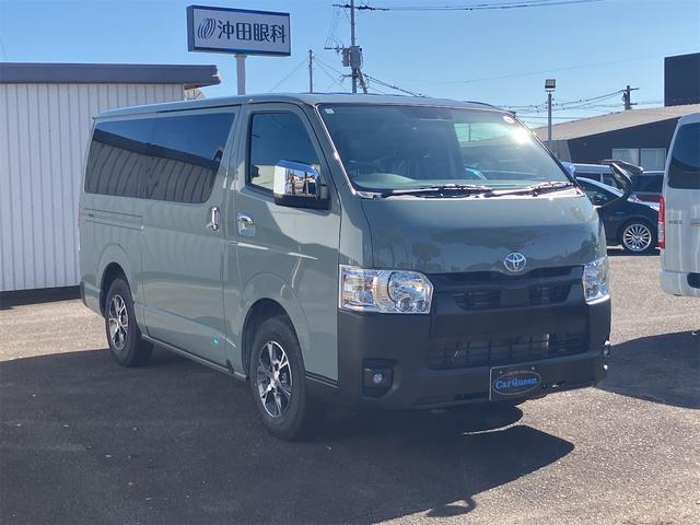 ハイエースバン ロングスーパーＧＬ　アースカラーパッケージ　登録済み未使用車　全周囲カメラ　クリアランスソナー　レーンアシスト　衝突被害軽減システム　両側電動スライドドア　オートマチックハイビーム　オートライト　ＬＥＤヘッドランプ（3枚目）