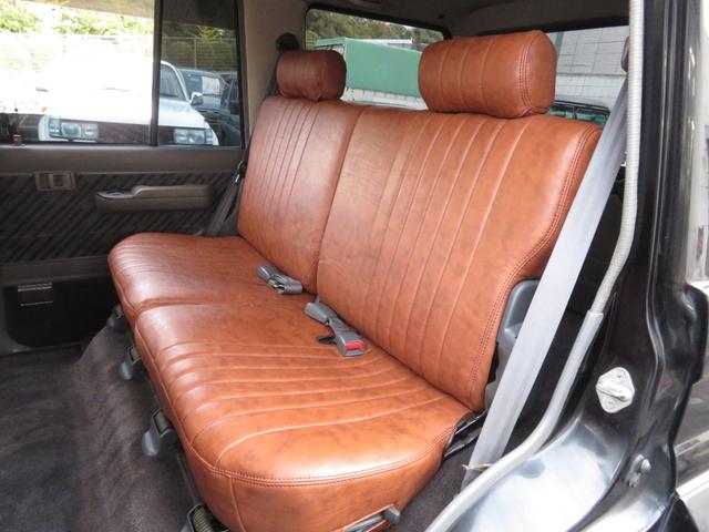 ランドクルーザープラド SXワイド 当社ユーザー買取車 全塗装済黒 新品グリル 社外レンズ 2インチUP 社外ショック 社外AW MTタイヤ 社外マフラー ナルディハンドル シートカバー 社外ナビ Bカメラ ドラレコ ETC キーレス(12枚目)