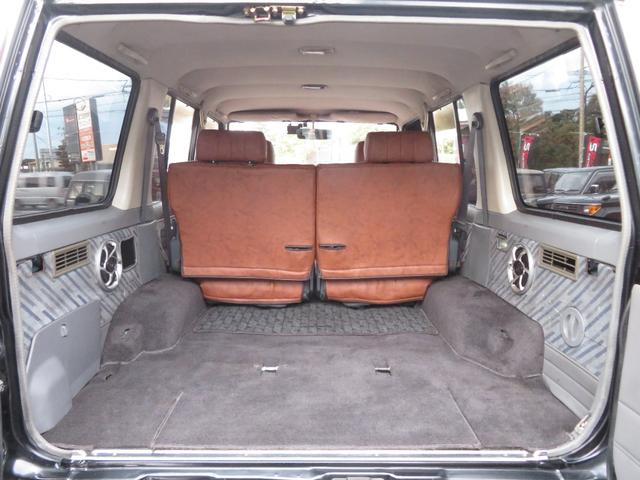 ランドクルーザープラド SXワイド 当社ユーザー買取車 全塗装済黒 新品グリル 社外レンズ 2インチUP 社外ショック 社外AW MTタイヤ 社外マフラー ナルディハンドル シートカバー 社外ナビ Bカメラ ドラレコ ETC キーレス(13枚目)