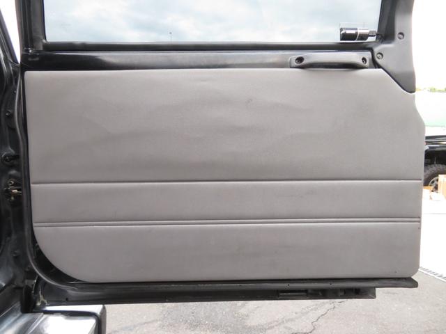 ランドクルーザープラド SXワイド 当社ユーザー買取車 全塗装済黒 新品グリル 社外レンズ 2インチUP 社外ショック 社外AW MTタイヤ 社外マフラー ナルディハンドル シートカバー 社外ナビ Bカメラ ドラレコ ETC キーレス(23枚目)