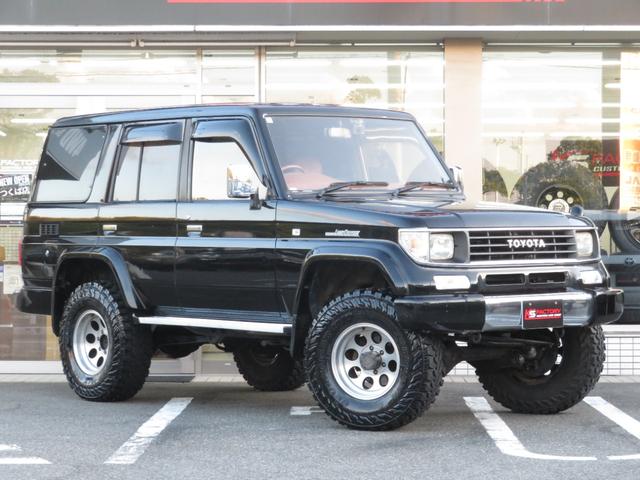 ランドクルーザープラド SXワイド 当社ユーザー買取車 全塗装済黒 新品グリル 社外レンズ 2インチUP 社外ショック 社外AW MTタイヤ 社外マフラー ナルディハンドル シートカバー 社外ナビ Bカメラ ドラレコ ETC キーレス(41枚目)