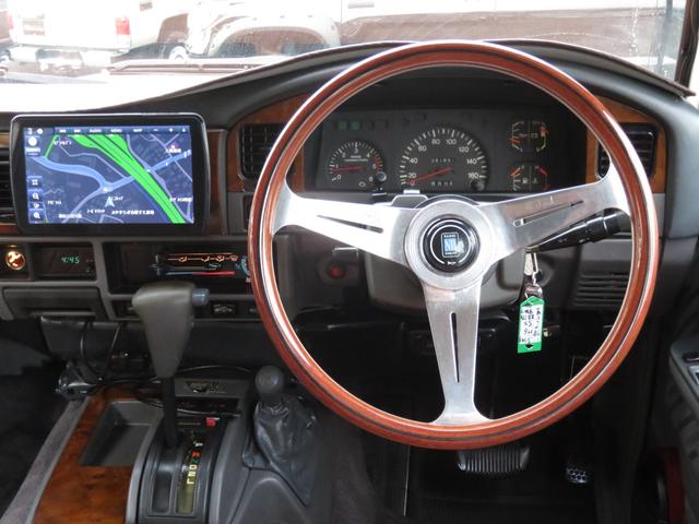 ランドクルーザープラド SXワイド 当社ユーザー買取車 全塗装済黒 新品グリル 社外レンズ 2インチUP 社外ショック 社外AW MTタイヤ 社外マフラー ナルディハンドル シートカバー 社外ナビ Bカメラ ドラレコ ETC キーレス(43枚目)